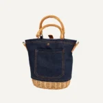 Denim willow woven bucket bag front view with natural handwoven wicker texture