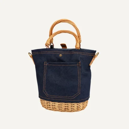 Denim willow woven bucket bag front view with natural handwoven wicker texture