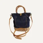 Natural wicker bucket bag styled for beach vacations and resort wear