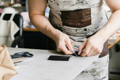 DIY bag kit materials with thick waxed thread and pre-punched leather