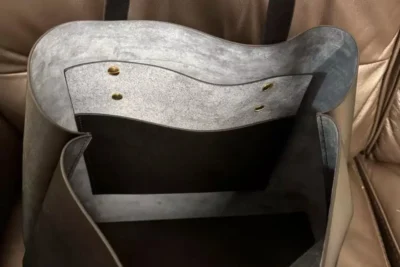 Close up details of a handmade genuine leather tote bag created from a DIY bag kit